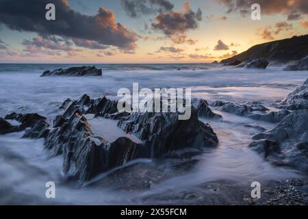 Sunset at Dollar Cove near Gunwalloe on the Lizard Peninsula, Cornwall, England.  Spring (April) 2024. Stock Photo