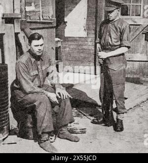 Josef Kramer aka The Beast of Belsen, commander of Belsen concentration camp seen here under British guard in 1945.  Josef Kramer, 1906 –1945. Hauptsturmführer and the Commandant of Auschwitz-Birkenau and of the Bergen-Belsen concentration camps.  From The War in Pictures, Sixth Year. Stock Photo