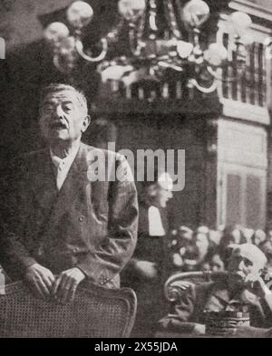 Pierre Laval seen here giving evidence at the trial of Philippe Petain, 23 July, 1945.  Pierre Jean Marie Laval, 1883 –1945. French politician and Prime Minister of France.  Henri Philippe Benoni Omer Pétain, 1856 – 1951, aka Philippe Pétain or Marshal Pétain. General commander of the French Army in World War I and head of the collaborationist regime of Vichy France, from 1940 to 1944.  The War in Pictures, Sixth Year. Stock Photo