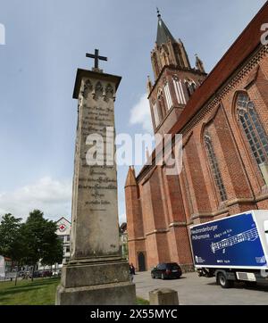 07 May 2024, Mecklenburg-Western Pomerania, Neubrandenburg: The monument to the Neubrandenburg theologian and pastor Franz Christian Boll (1776-1818) can once again be seen next to St. Mary's Church in the city center after extensive restoration work. The monument was created by Caspar David Friedrich (1774-1840) after Boll's death and is the only realized monument to the most famous Romantic painter. Photo: Bernd Wüstneck/dpa Stock Photo