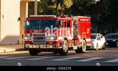 A Los Angeles Fire Department (LAFD) truck, number 37, waiting at an intersection in Westwood, Los Angeles, California. Stock Photo