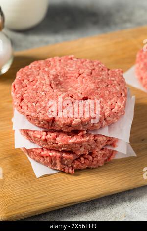 Raw Grass Fed Beef Hamburgers Ready to Cook Stock Photo