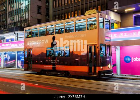 Hong Kong, China - April 6, 2024: Hong Kong Tramway Double-decker Public Transport Streetcar At Pedder Street Stop In Hong Kong, China. Stock Photo