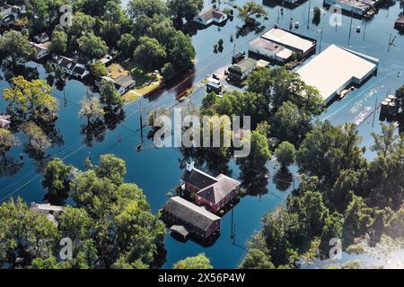 Aerial drone view of torrential rain causes flash floods in residential ...
