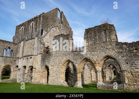 Historic medieval ruins of former church abbey. stone remains of religious site Netley Abbey in Hampshire England Stock Photo