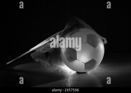 soccer ball,goalpost and goalnet.Great international soccer event in europe 2024.High contrast black and white shot,free copy space. Stock Photo