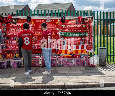 Fans buying scarf outside Anfield during the English Premier League soccer match between Liverpool FC and Tottenham Hotspur F.C.May 5.2024,Liverpool Stock Photo