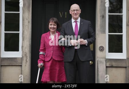 (240507) -- EDINBURGH (BRITAIN), May 7, 2024 (Xinhua) -- John Swinney arrives at Bute House with his wife in Edinburgh, Britain, on May 7, 2024. Scottish lawmakers on Tuesday voted for Scottish National Party (SNP) leader John Swinney to become Scotland's first minister, replacing Humza Yousaf who formally stepped down earlier the same day. (Scottish government/Handout via Xinhua) Stock Photo