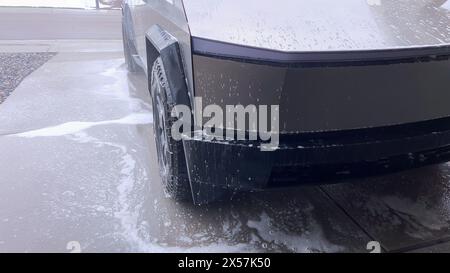 High-Pressure Cleaning of a Tesla Cybertruck Front End Stock Photo - Alamy
