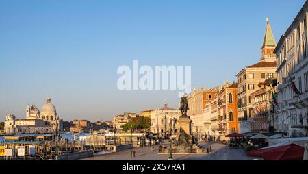 Riva degli Schiavoni promenade with monument to Victor Emmanuel II, Venice, Veneto, Italy Stock Photo