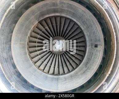 Closeup view looking inside a big jet engine on a modern airplane wing Stock Photo