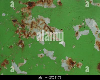 Up close the surface of the zinc iron paint is peeling off rust. Abstract Background Stock Photo