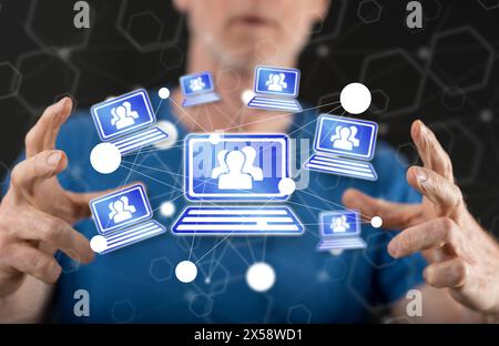Video conference concept between hands of a man in background Stock Photo