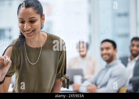 Presentation, glass wall and business woman writing in office for research information with team. Brainstorming, planning and group of designers Stock Photo