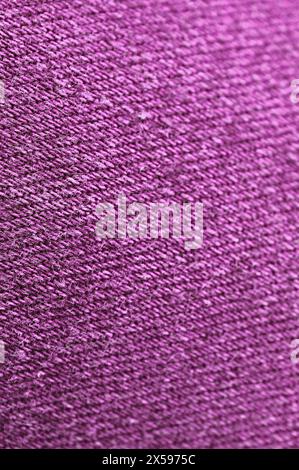 Closeup of Magenta Purple Colored Jeans Fabric Texture with Selective Focus Stock Photo