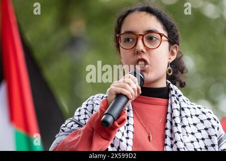 London, UK. 7th May, 2024. A student from the School of Oriental and African Studies (SOAS) addresses pro-Palestinian protesters taking part in a Hands Off Rafah demonstration outside Downing Street. The emergency demonstration was called in response to the Israeli military having commenced a military operation in Rafah, Gaza, where 1.3m Palestinians are sheltering. Credit: Mark Kerrison/Alamy Live News Stock Photo