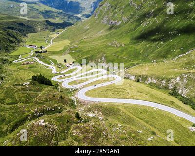 Drone image over the serpentine road through the Swiss Alps Julier Pass in summer Stock Photo