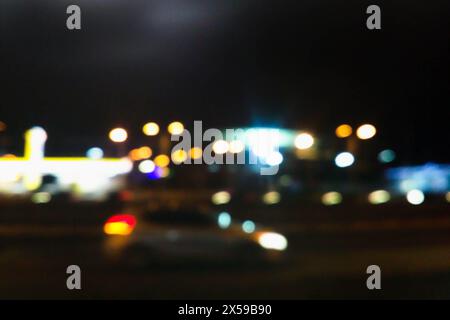 abstract blurred night city background, multi-colored blurred light of colored lights Stock Photo