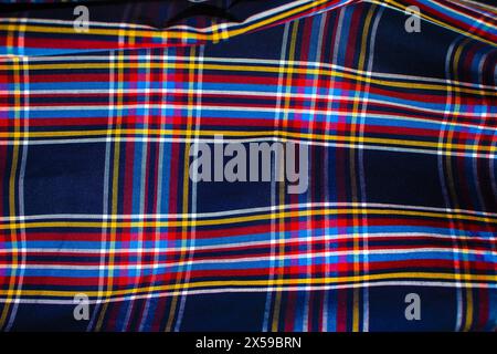 Shirt fabric in colored checkered pattern.Natural textile background. Fabric texture background. Texture of natural linen fabric. Stock Photo