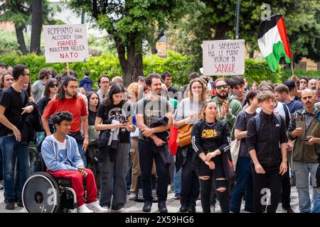 Rome, Rm, Italy. 8th May, 2024. Students and professors gather in front of the memorial plaque, placed last week at the entrance of Physics Faculty, to remember Sufian Tayeh (Palestinian physicist, rector of Gaza University, killed last December during bombing of Gaza). The plaque has been vandalized yesterday by a group of masked people. ''Israel'' and stars of David have also been painted on the wall. (Credit Image: © Marco Di Gianvito/ZUMA Press Wire) EDITORIAL USAGE ONLY! Not for Commercial USAGE! Stock Photo