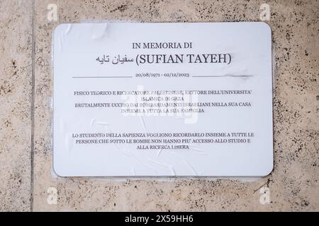 Rome, Rm, Italy. 8th May, 2024. Students and professors gather in front of the memorial plaque, placed last week at the entrance of Physics Faculty, to remember Sufian Tayeh (Palestinian physicist, rector of Gaza University, killed last December during bombing of Gaza). The plaque has been vandalized yesterday by a group of masked people. ''Israel'' and stars of David have also been painted on the wall. The plaque is now replaced with a temporary paper copy of the original. (Credit Image: © Marco Di Gianvito/ZUMA Press Wire) EDITORIAL USAGE ONLY! Not for Commercial USAGE! Stock Photo