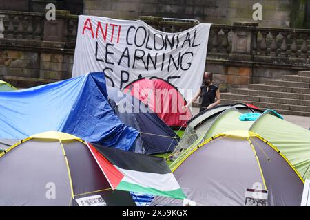 Students at an encampment at the Old College at the University of Edinburgh, protesting against the war in Gaza. Students in the UK, including in Leeds, Newcastle and Bristol, have set up tents outside university buildings, replicating the nationwide campus demonstrations which began in the US last month. Picture date: Wednesday May 8, 2024. Stock Photo