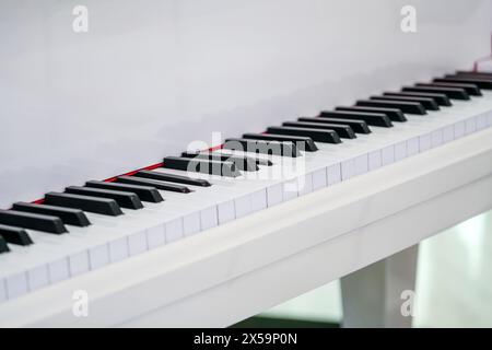 Automatic production of melody by robot, computer artificial intelligence piano keyboard pianist to rehearse before the classical, performance in cele Stock Photo