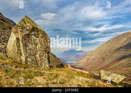 View down Kirkstone Pass, Cumbria, England, with the 'Kirk Stone' boulder on the left. Stock Photo