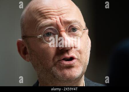 Edinburgh, Scotland, UK. 8th May, 2024. PICTURED: Patrick Harvie MSP, Scottish Green Party Co-Leader. On the day that the new Scottish First Minister, John Swinney MSP, is sworn in and announcing his new cabinet, scenes inside the Scottish Parliament at Holyrood where parliamentary members give their reactions to the unfolding news. Credit: Colin D Fisher Credit: Colin Fisher/Alamy Live News Stock Photo