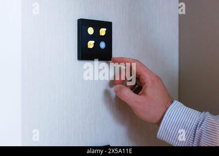 Man entering code on home security system, closeup Stock Photo