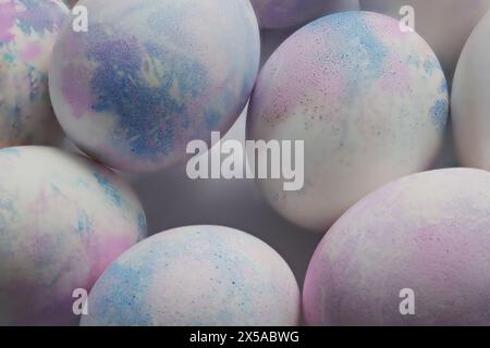 Close-up of hand painted with markers for drawing, decorated easter eggs. Stock Photo