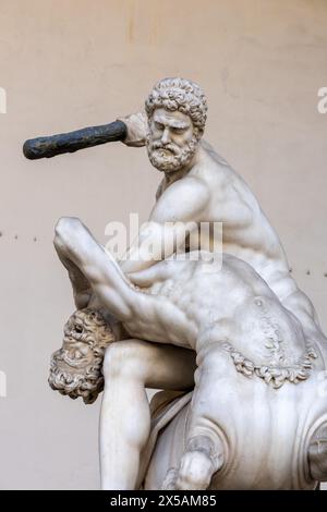 Florence, Italy - Sep 09 2023: Marble statue of cain slaying outside palazzo vecchio. Stock Photo