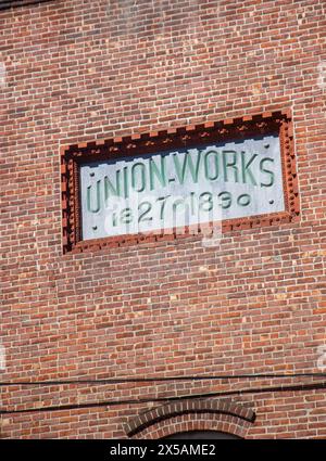 Dated sign on the wall of a factory in Patterson, New Jersey Stock Photo