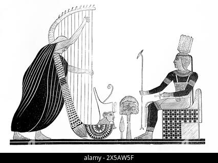 Wood Engraving of A Harp Player Found in Tomb KV9 in Valley of the Kings Egypt in Antique 19th Century Illustrated Family Bible Stock Photo