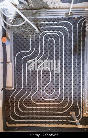 Underfloor heating system installation in progress, top view Stock Photo