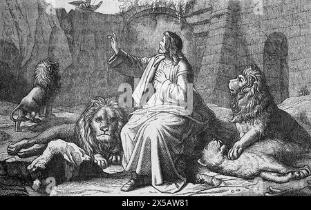 Wood Engraving of Daniel in the Lions Den and an Angel of the Lord 'My God Hath Sent His Angel, And Hath Shut the Lions Mouths' (Book of Daniel) From Stock Photo