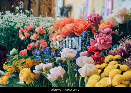 Various colorful flowers in a flower shop, Barcelona, ​​on April 16, 2024 Stock Photo