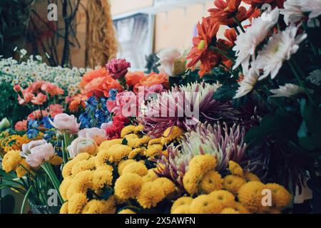 Various colorful flowers in a flower shop, Barcelona, ​​on April 16, 2024 Stock Photo