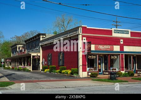 Matteo's Italian Restaurant anchors a corner of quaint shops and vintage facades in this tiny southwestern Cleveland suburb with a railroad theme. Stock Photo
