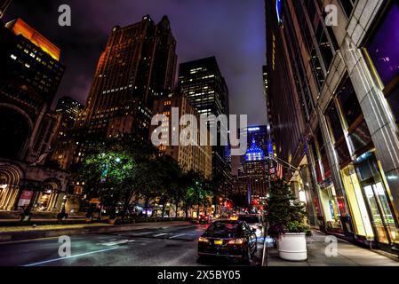 Night View from Park Ave at the Intersection with 51st Street  to the MetLife Building - New York City Stock Photo