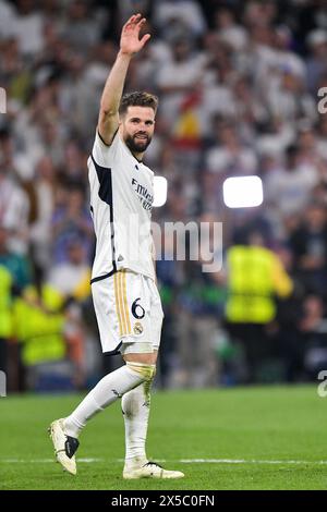 Madrid, Spain. 08th May, 2024. MADRID, SPAIN - MAY 8: Nacho of Real Madrid celebrates during the Semi-final Second Leg - UEFA Champions League 2023/24 match between Real Madrid and FC Bayern Munchen at Estadio Santiago Bernabeu on May 8, 2024 in Madrid, Spain. (Photo by Pablo Morano/BSR Agency) Credit: BSR Agency/Alamy Live News Stock Photo