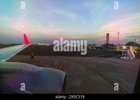 View from the airplane window of the airport taxiway. View from the plane window. Stock Photo