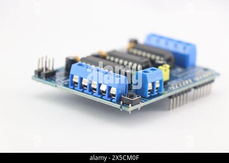 Motor driver or servo shield with a close up view of connection pins on a white background Stock Photo
