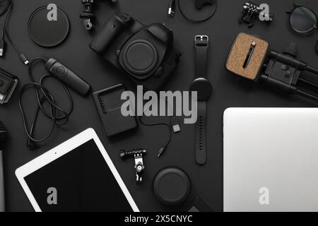 Composition with different modern gadgets on dark background Stock Photo