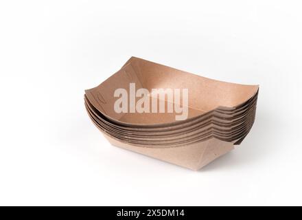 Recycled paper trays for snacks, isolated on a white background. Stock Photo