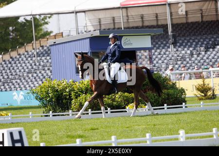 Badminton, Uk . 09th May, 2024. Zara Tindall completes her Dressage Test at the Mars Badminton Horse Trials watched by her father Captain Mark Phillips a four time winner of the prestigious event. Zara Riding her horse Class Affair completed the test with a creditable score of 63.70 Credit: David Betteridge/Alamy Live News Stock Photo