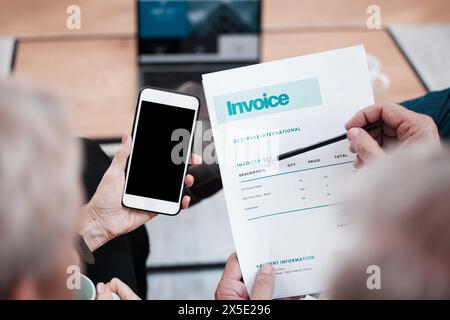 Hands, smartphone and invoice with bill for payment, house finance and purchase in home. People, budget and planning for saving or investment with Stock Photo
