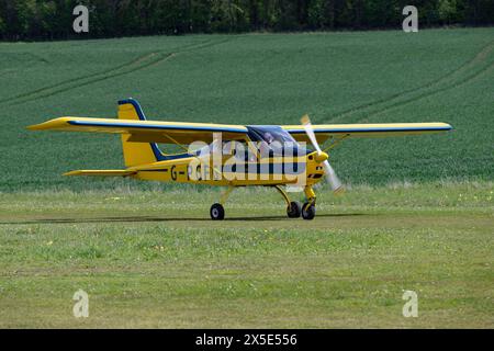 Lovely clean Tecnam P92 Echo single engine light airplane arrives at Popham airfield in Hampshire England Stock Photo