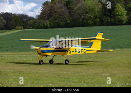 Lovely clean Tecnam P92 Echo single engine light airplane arrives at Popham airfield in Hampshire England Stock Photo