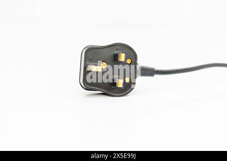 Three pin ac power plug isolated on white background Stock Photo